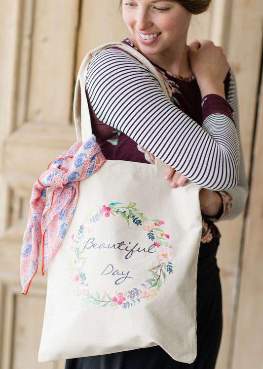 beautiful day floral graphic on a canvas tote