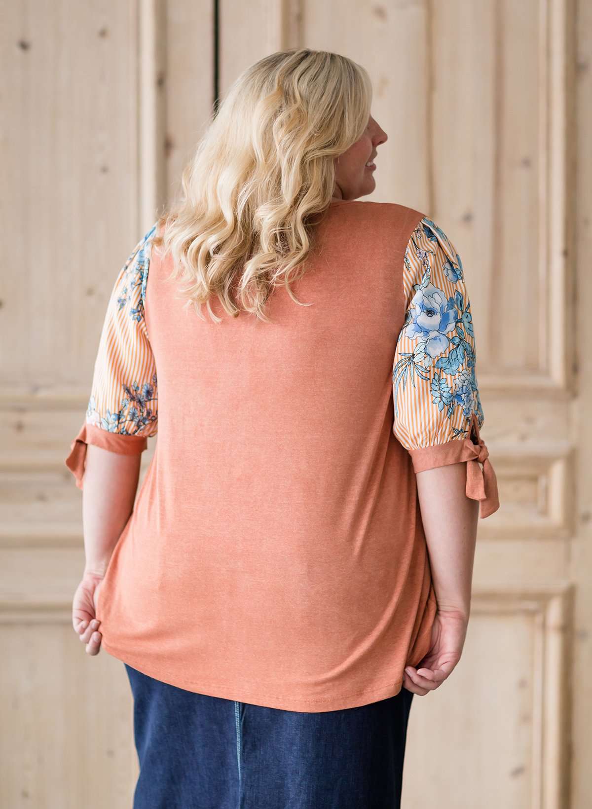 cork colored plus size modest top with floral tie sleeves.