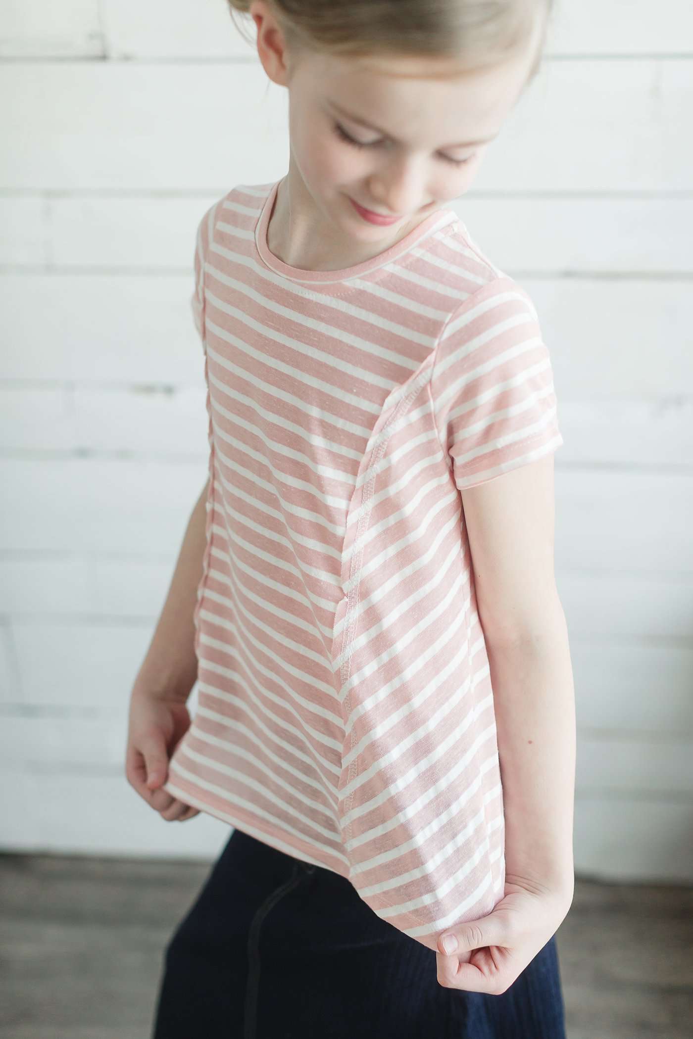 navy and white or pink and white striped girls short sleeve tee with raw edge front.