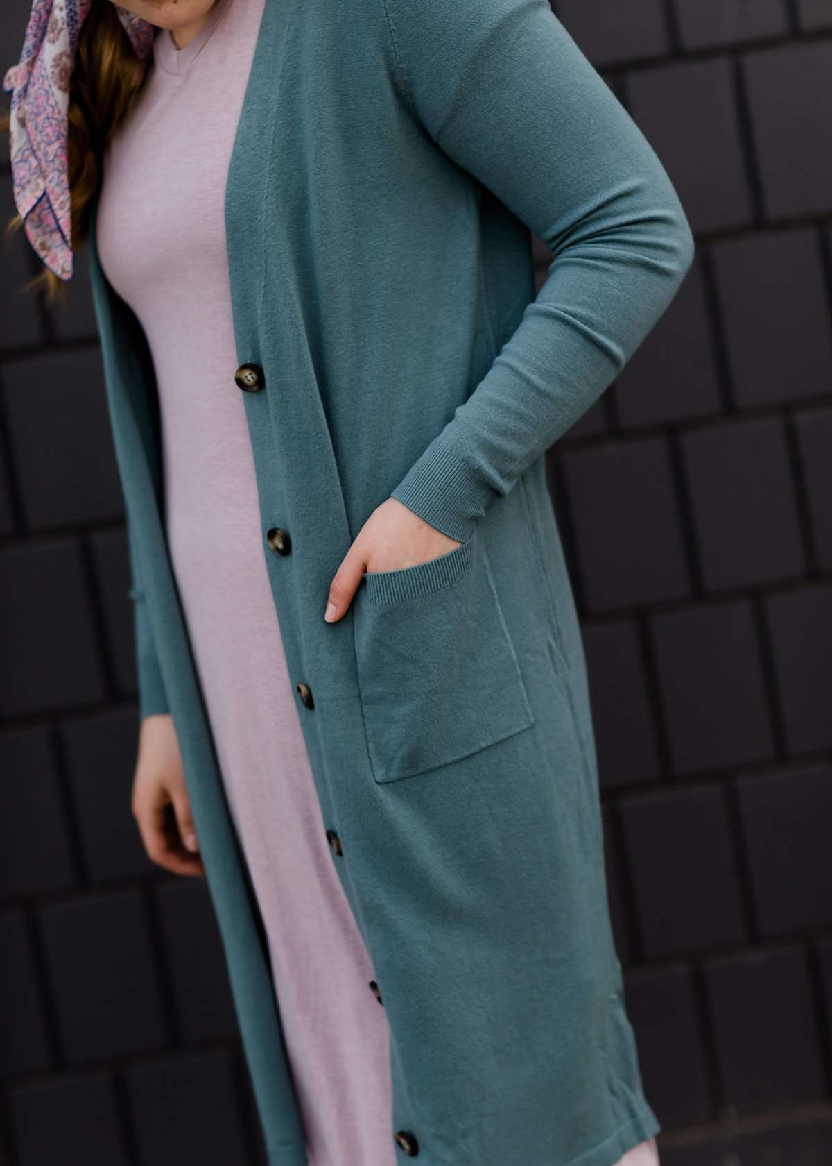 jade colored long double pocket button up cardigan