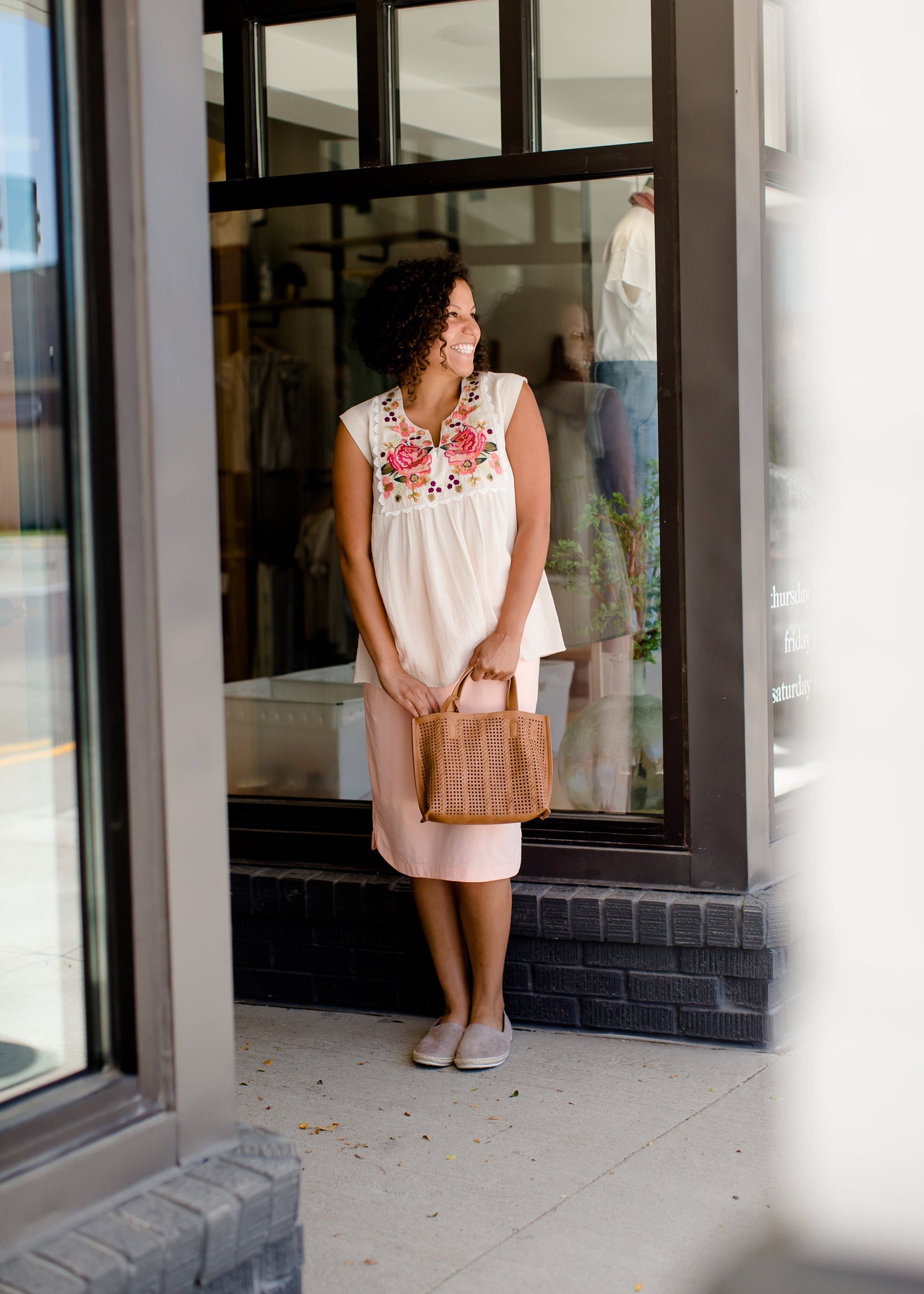 Floral embroidered smocked white top