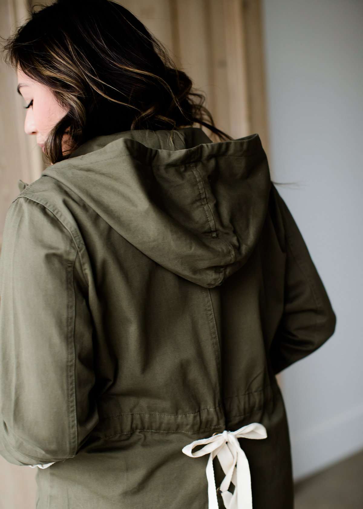 olive green hooded cargo jacket with lace up detail