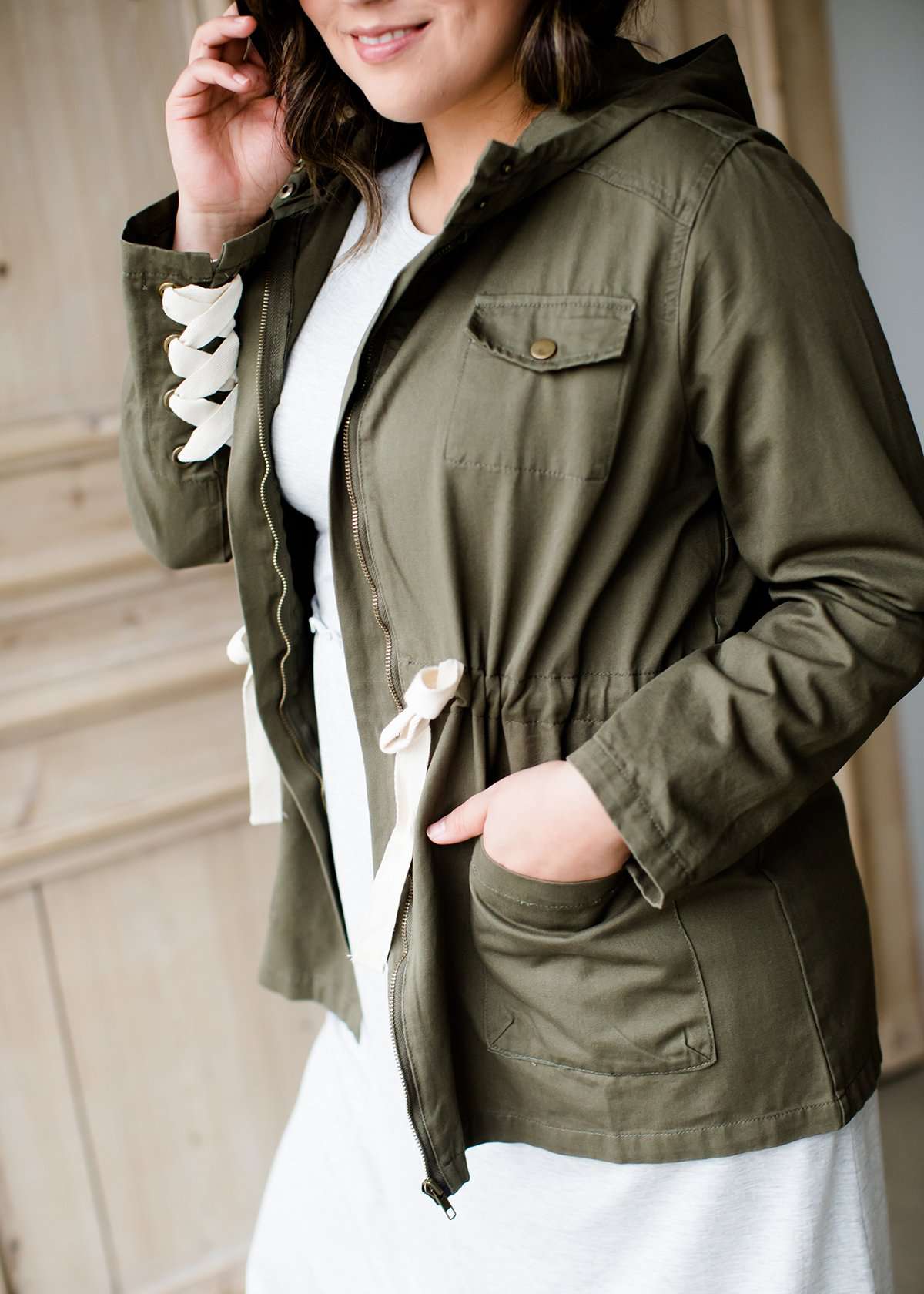 olive green hooded cargo jacket with lace up detail