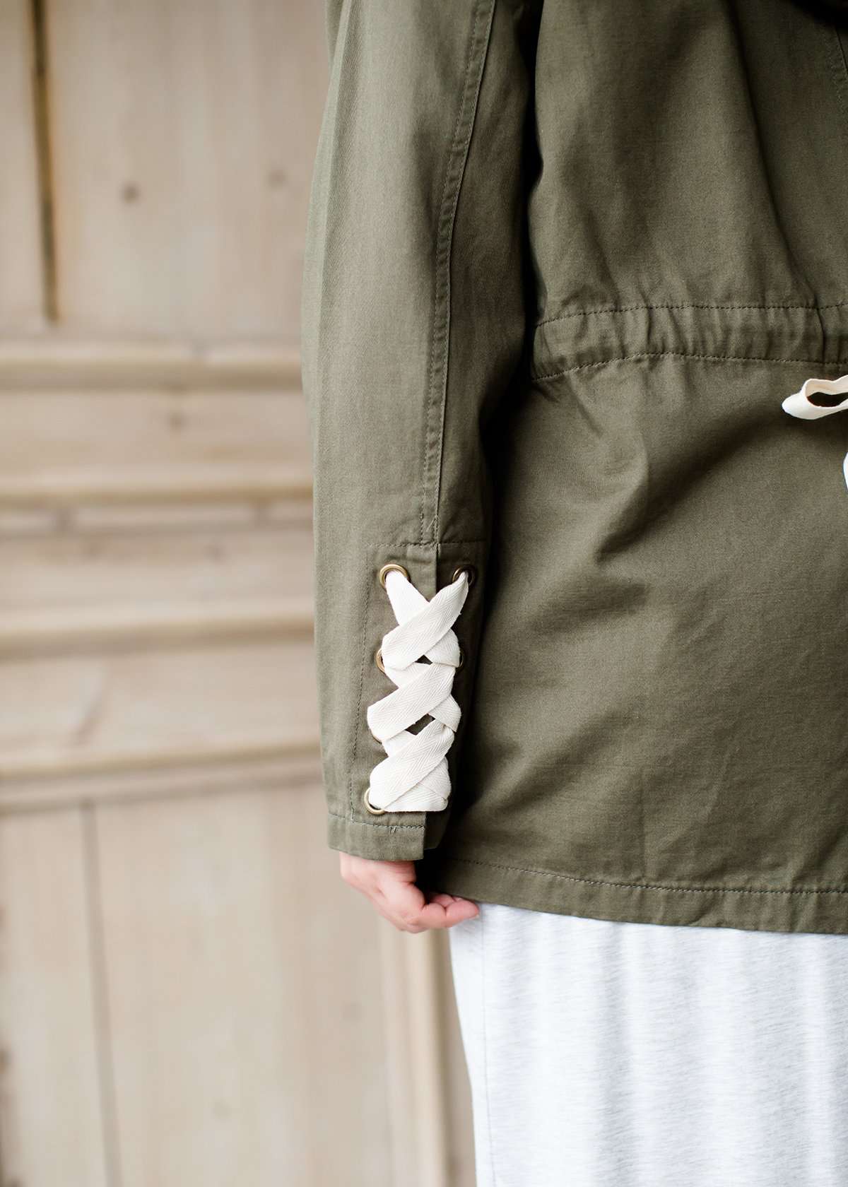 olive green hooded cargo jacket with lace up detail