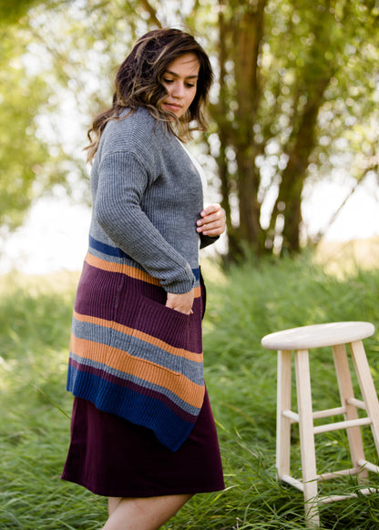 Long knit charcoal womens cardigan with orange and burgundy stripes