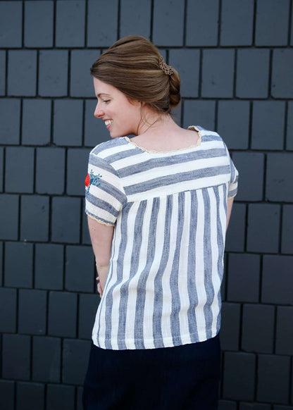 women's modest blue and white striped top with embroidered flowers