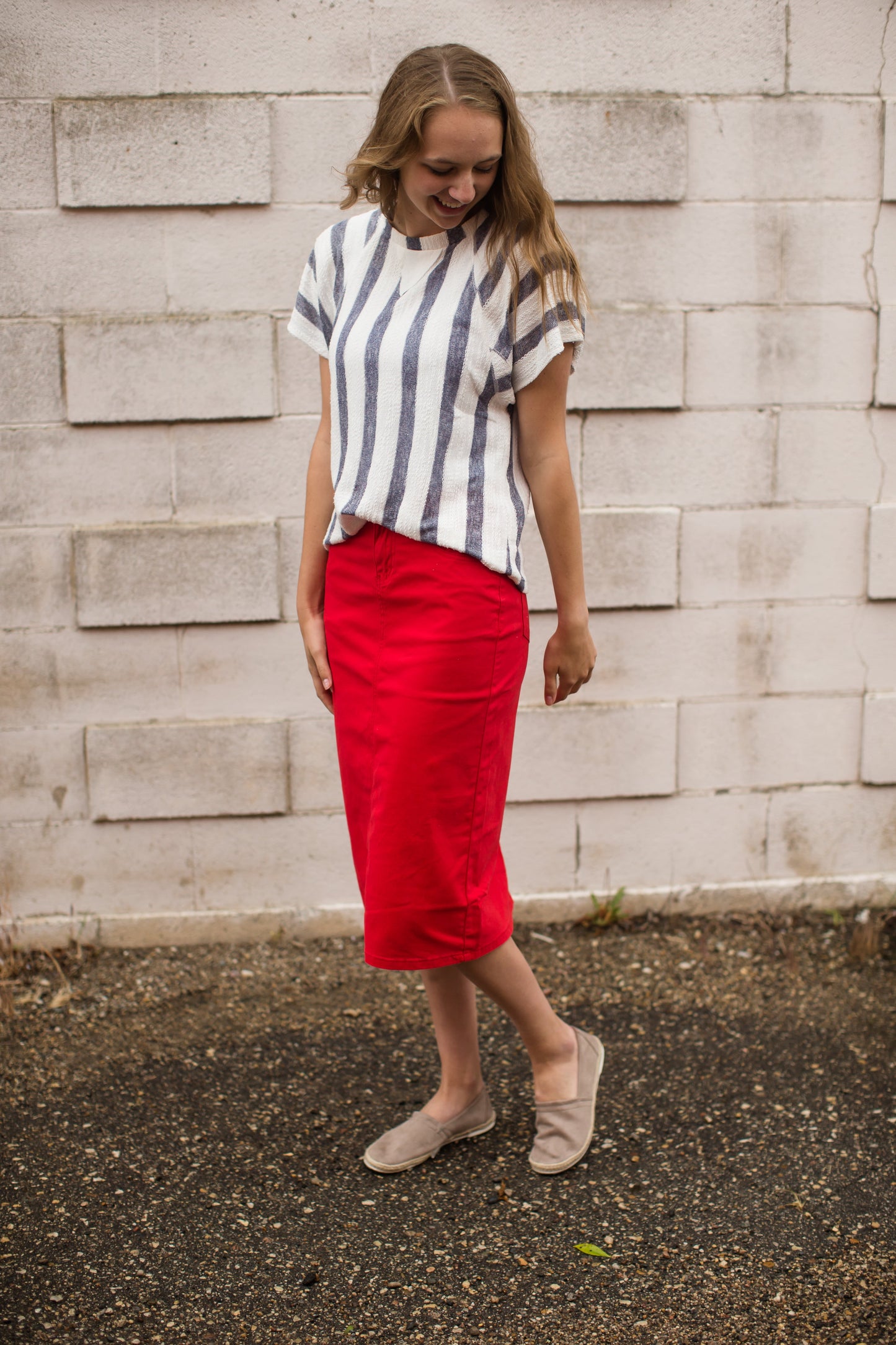 blue and white striped knit top