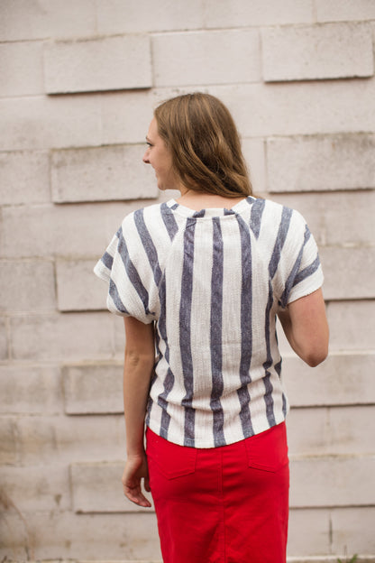 blue and white striped knit top