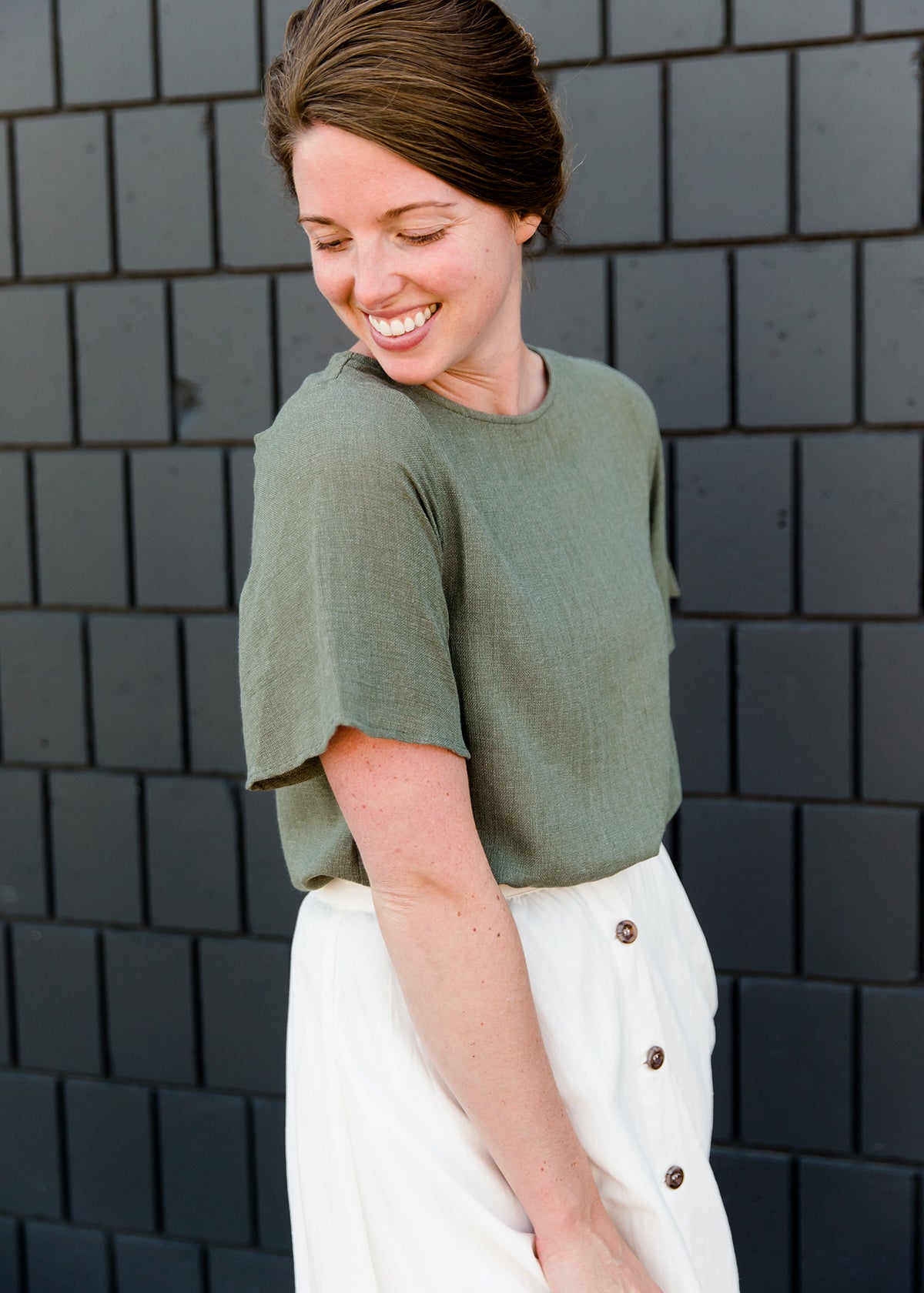 Olive blouse with a button detail