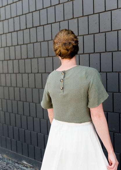 Olive blouse with a button detail