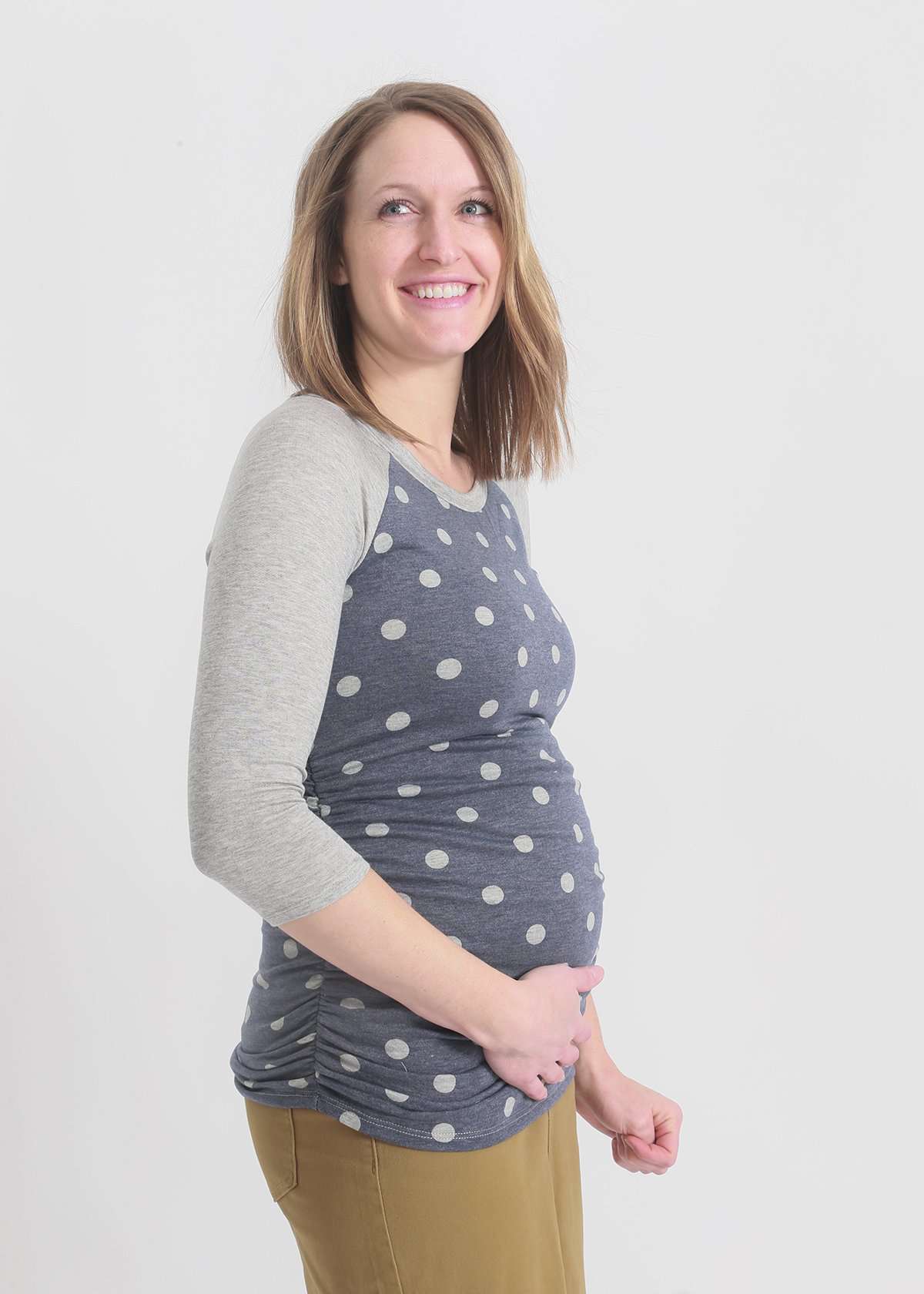 gray and white polka dot maternity top