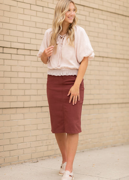 This Remi is a straight fit skirt that is a fan favorite Inherit Design. This rosewood color is gorgeous and will go with all the things. It comes in sizes 26" + 29" lengths with a slit in the back for walkability.