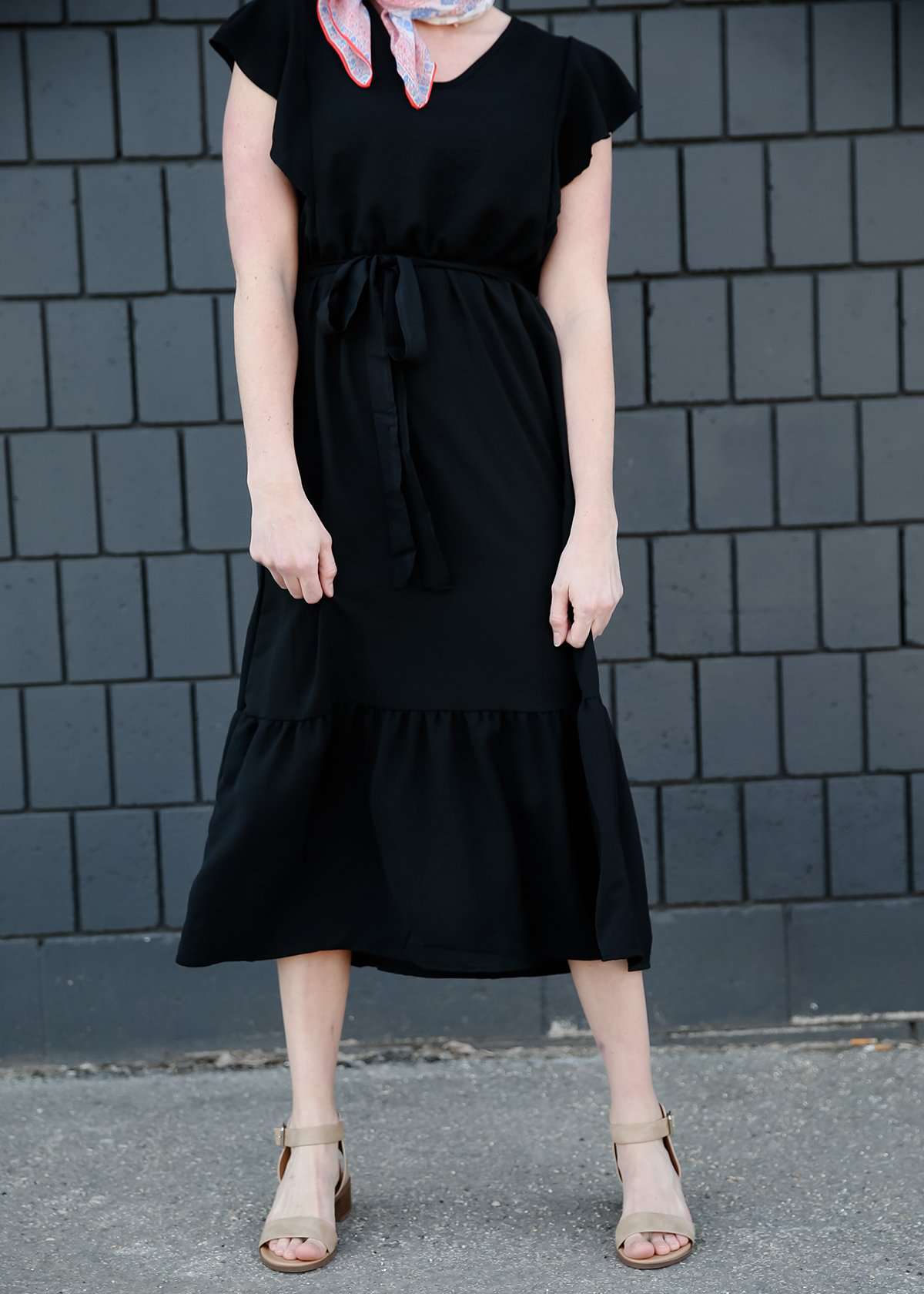 Modest women's black ruffled midi dress